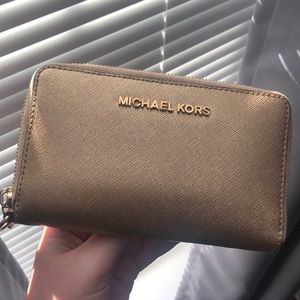 Michael Kors gold chrome wallet without bracelet